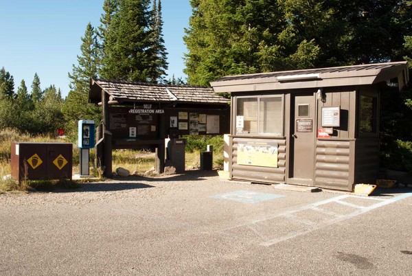 Jenny Lake Campground registration kiosk with campground information.
