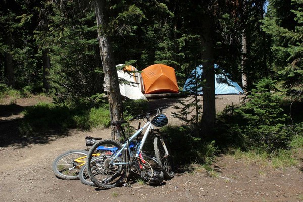 Tents and bikes at campsites